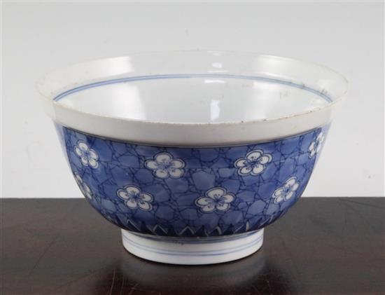 A Chinese blue and white prunus and cracked ice bowl, Chenghua six character mark, Kangxi period, diam. 15.5cm